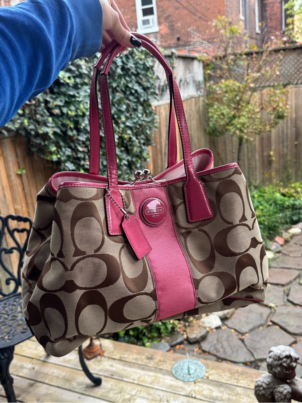 coach pink kisslock purse